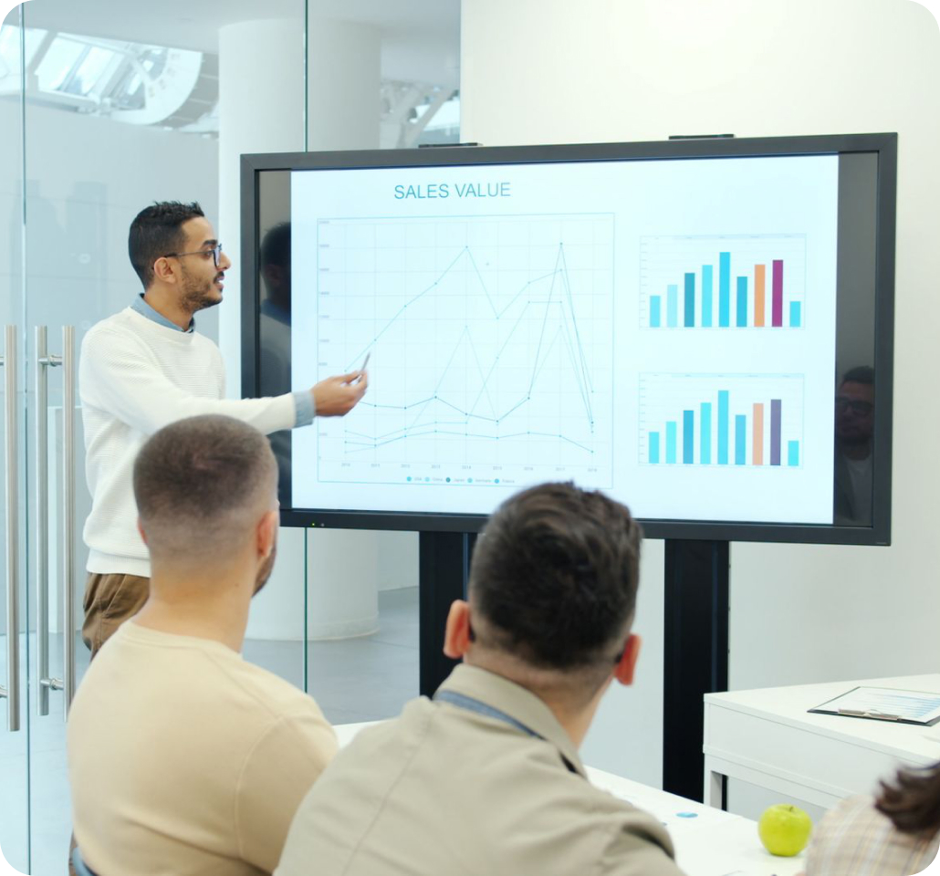 iMC consultant presenting business analytics to a team