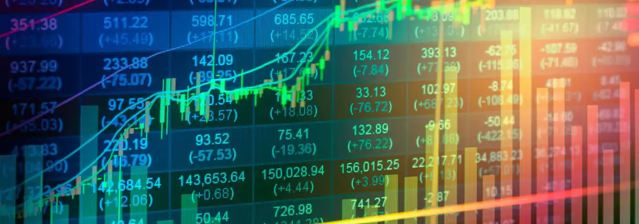 Stock market data and price charts on a digital display