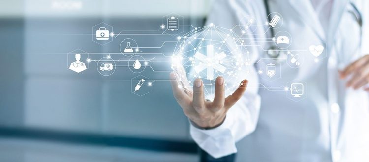 Doctor holding a glowing network of digital healthcare icons